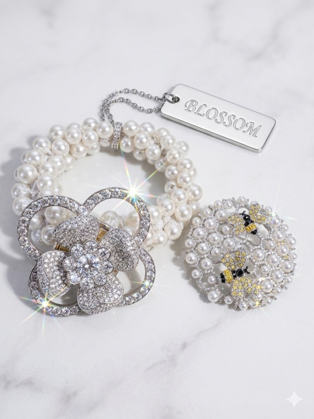 Pearl Stretch Bracelet with White Floral Crystal Accent and Bee Brooch